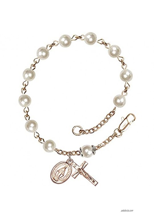 F A Dumont 14kt Gold Filled Rosary Bracelet Features 6mm Faux Pearl Beads. The Crucifix Measures 5/8 x 1/4.