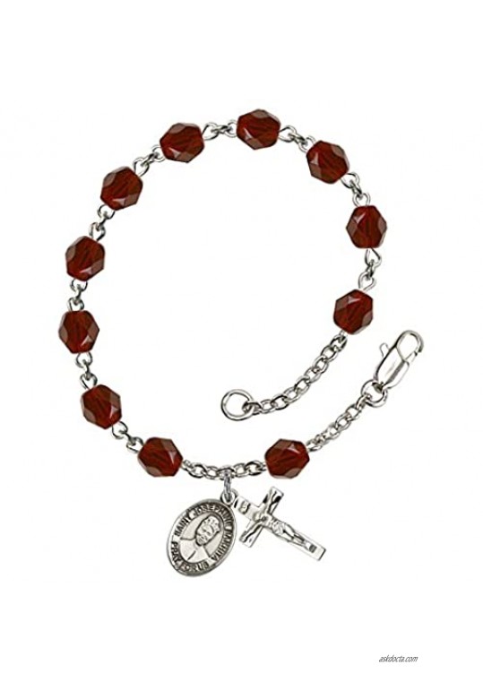 Silver Plate Rosary Bracelet features 6mm Garnet Fire Polished beads. The Crucifix measures 5/8 x 1/4. The charm features a St. Josephine Bakhita medal.
